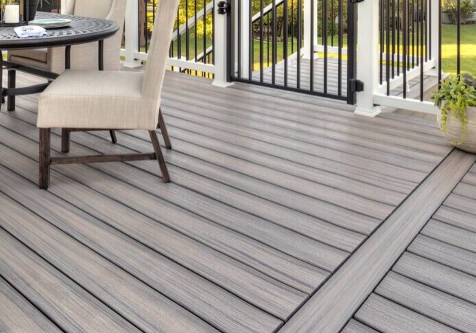 Modern backyard deck with table and chairs